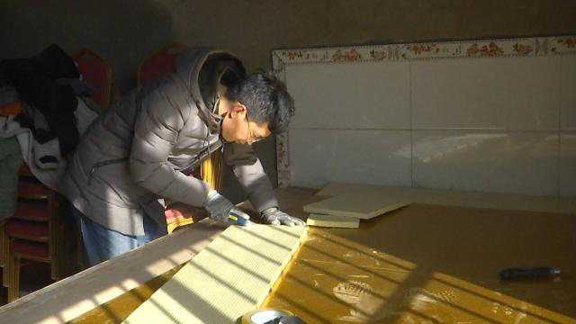 “土炕”变“电炕”，暖家又暖心